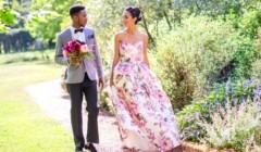 Couple walking through gardens at Bignor Park in West Sussex, stylish outdoor wedding venue