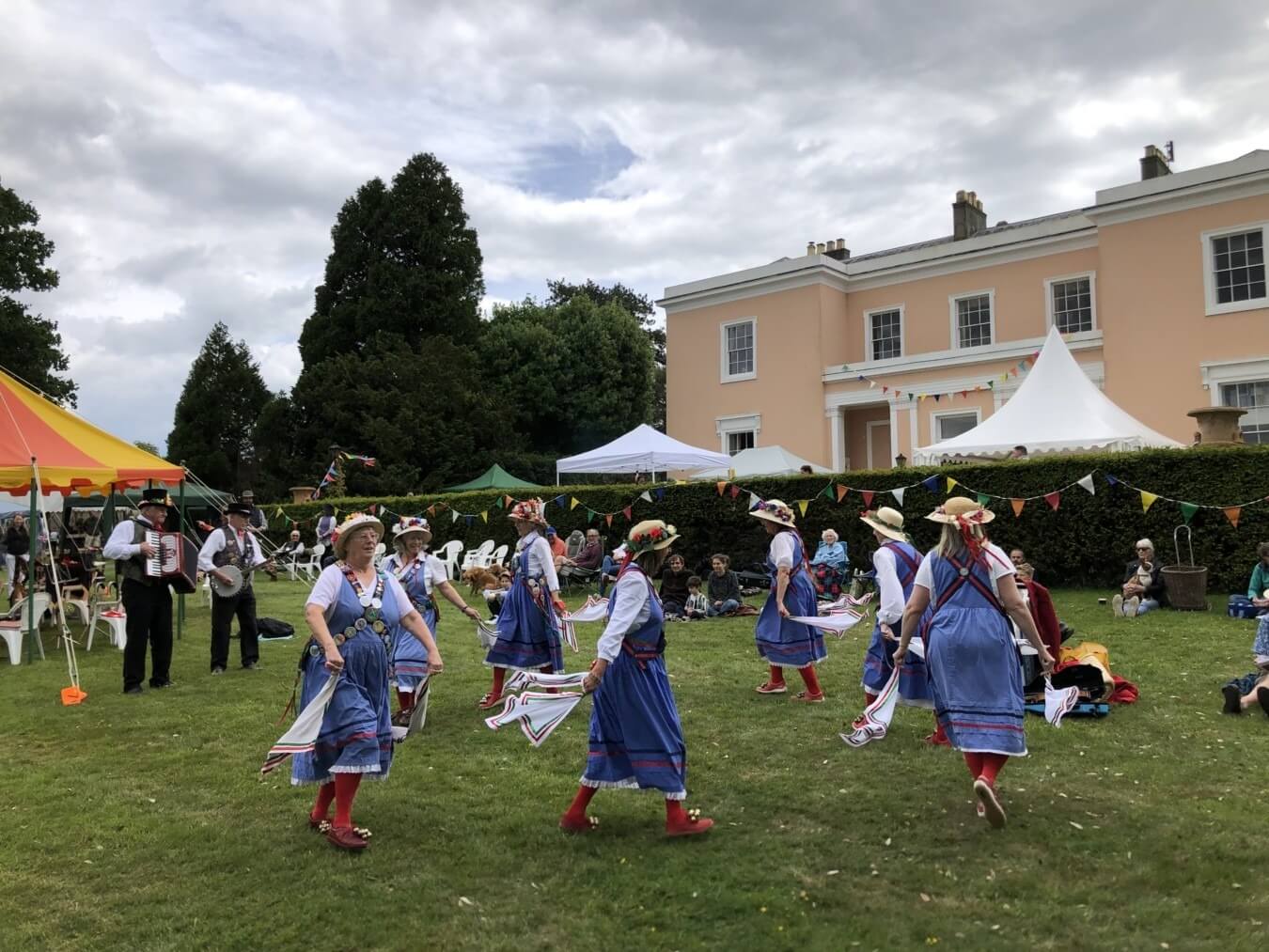 Rural dancers at Fete held infront of the main house of Bignor House in West Sussex